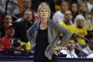 Head coach Lisa Bluder of the Iowa Hawkeyes reacts during the first half of a game against the Rutgers Scarlet Knights.